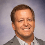 A professional headshot of UTK faculty member John Bell