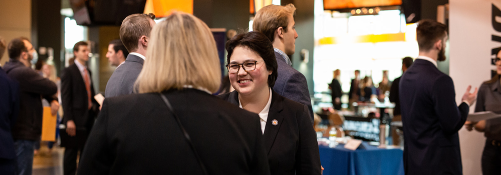 a recruiter talking to a student