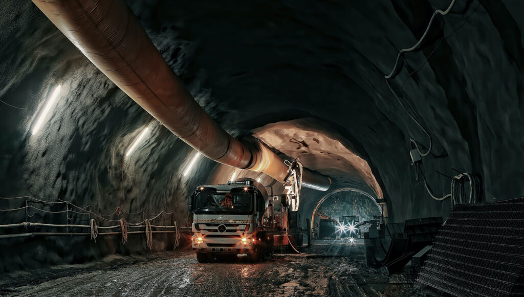 a truck driving through a tunnel