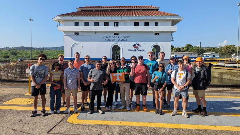 UT supply chain professor Alex Rodrigues and undergraduate students at the Panama Canal.